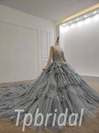 Practically every young lady has pondered about her wedding. Grey Ball Gown Wedding Dress Long Sleeves Prom Dress With Flowers