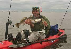 Staying Warm Kayak Fishing Pack And Paddle