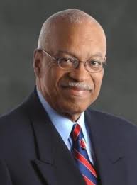 WADE'S PHARMACY Walter, Clara, and Gerald Wade Walter Wade, shown with his  wife, Clara, and son Gerald, went to work at Fernish's Drugstore in 1938.  The Fernish family sold the business to