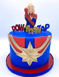 A modern design chocolate cake covered by chocolate mousse and coco spray. Captain Marvel Artofit