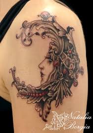 The ideal site for tattoo addicts who are struggling to find inspiration for their next piece of ink. Lovely Lady Face Moon Tattoo On Shoulder Tattoo Models Designs Quotes And Ideas