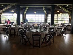 Guest Tables At The Presidio Log Cabin Mahogany Wood Folding Chairs Photo Credit Miraglia Catering Wood Folding Chair Log Cabin Mahogany Wood