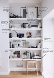 This decorative storage 30 h x 43.98 w cube bookcase takes storage and organization to the next level. How To Decorate Your Shelves The Minimal Style The White Interior Shelf Decor Living Room Living Room Shelves Bookcase Decor