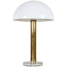 When you turn one on with a simple touch of your hand, its mate emits the same ambient glow, no matter where it is and who is on the other end: Touch Lamp Brass 9 For Sale On 1stdibs