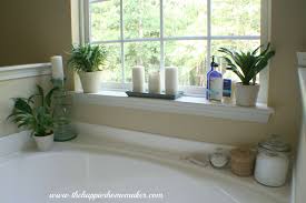 Sometimes, people are not comfortable doing their activity in front of the vanity side by side. Decorating Around A Bathtub The Happier Homemaker Bathtub Decor Garden Tub Decorating Jacuzzi Tub Decor