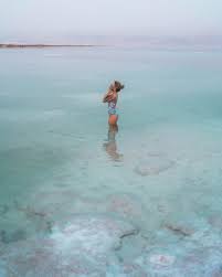 Floating In The Dead Sea Israel Find Us Lost Dead Sea Travel Pictures Summer Travel