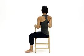 10 Yoga Poses You Can Do In A Chair Chair Pose Yoga Yoga Poses Essential Yoga