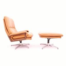 A stunning example of this most beautifull and sculptural swivel lounge chair and ottoman in the most sought after cognac leather in extremely good condition designed by gosta berg and stenerik eriksson for fritz hansen in 1968 and made in small numbers until it ceased production in 1973. Swiss Design King Lounge Chair With Ottoman In Cognac Leather By Andre Vandenbeuck For Strassle 48337