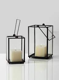 The purpose of light is to create more light, to open people's eyes, to reveal the marvels around. 7in Black Square Hurricane Lantern Hurricane Lanterns Minimalist Lanterns Modern Lanterns
