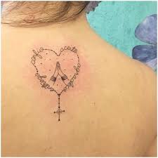If you are looking to get a rosary tattoo, then this video has some amazing designs that you. Praying Hands In Holy Word Heart Shape Rosary Tattoo Entertainmentmesh
