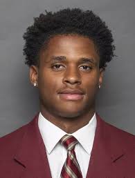 Football Players Give Back On Their Off Day