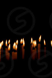 Many Christmas Candles Burning At Night On The Black Background Candle Flame Set Isolated In Black Background Group Of Burning Candles In Dark With Shallow Depth Of Field Close Up Free Space By