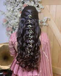 The side bangs are swiftly swept to one side in this hairstyle. 30 Flawless Open Hairstyles For Your Wedding Functions Shaadisaga