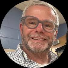 John Bricker, provides online therapy