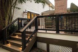 White House Black Window Frames Black Railings Wood Toned Deck White Lattice Wood Deck Railing Building A Deck Deck Stairs