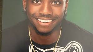 Amidst mourning and memories, a Md. family demands justice for son killed  during vigil