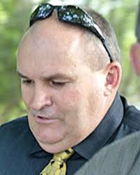 Ex-policeman's wife accused of lying to provide alibi