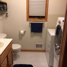 We installed a medallion silverline white icing painted lancaster doors with feet vanity with bianca luna laminate. How Do I Maximize The Space In A Half Bath Laundry Room Combo Hometalk