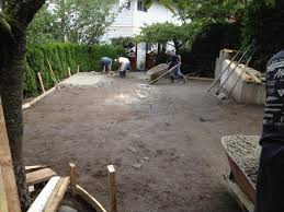 Concrete landscape edging reduces mowing and trimming time. Concrete Forming Foundations Finishing Victoria Bc Pacific Group Developments