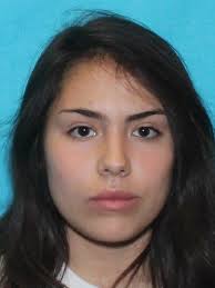 Woman ejected, killed in crash