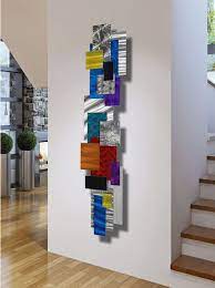 Some of the most popular vertical garden systems are hanging pot plants positioned along fence or balcony rungs. Beautiful Vertical Wall Art It S Really Colorful And The Square And Rectangle 3d Look Of The Pieces Look Wall Sculpture Art Hanging Wall Art Vertical Wall Art