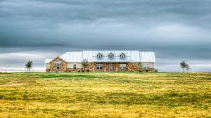 Country ranch home plans frequently forgo the common central hallways that divide the home and instead include a great room that encourages unity and openness. Architectural Designs 4 Bed Hill Country Ranch House Plan 64003bb Craftsman Austin By Architectural Designs