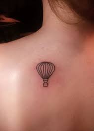 small air balloon tattoo on back