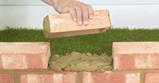 How To Build A Short Retaining Wall Brick Wall Gardens Brick Garden Brick Garden Edging