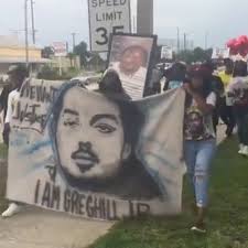 Hundreds march in protest of jury verdict awarding $4 to family of man  killed by deputy
