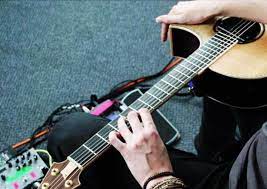 How To Play Guitar On Your Lap Using Two Hand Tapping Guitar Playing Guitar Lap