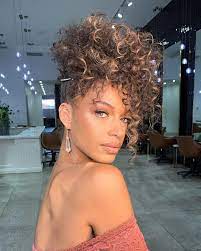 The 1980s Banana Clip Is Back And Cooler Than Ever For Fall 2020 Banana Clip Hairstyles Clip Hairstyles Curly Hair Styles