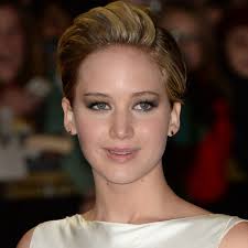 Watch: Jennifer Lawrence Walks Off The Hunger Games: Catching Fire Premiere  Red Carpet to Comfort Crying Fan