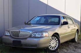 Image result for Light Ice Blue 2005 Town Car