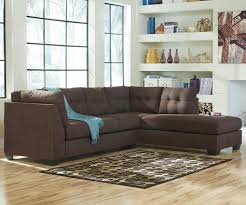 Ease into the plush cushioning fitted with high density foam for you, family and guests to relax and enjoy for years to come with the cushions being designed to resist untimely sagging and wear over time with thick underside coil spring reinforcement. Benchcraft By Ashley Maier Walnut 2 Piece Sectional W Sleeper Sofa Right Chaise Royal Furniture Sectional Sofas