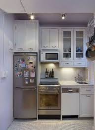 Bars across the back finish the look with extra hanging storage for utensils and cups. 17 Kitchenette Ideas Tiny Kitchen Kitchenette Kitchen Design