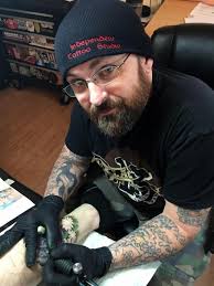 Transom stories: TC artist tells stories with needle and ink