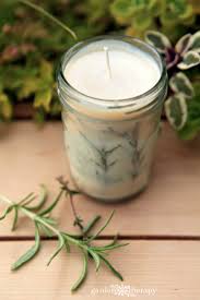 Apply the pressed flowers or dried herbs to the candle. Evergreen Pressed Rosemary Candles How To Make Herbal Candles