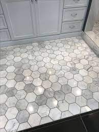 Small tiles in a small bathroom actually make the room look even smaller because of the visible grouting lines. Beautiful Bathroom Tiles Ideas For Small Bathrooms You Can Begin With Renovating The Floor And Wall With One Of Hexagon Tile Floor Home Remodeling Dark Grout