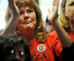 1,000 county workers protest as layoffs continue