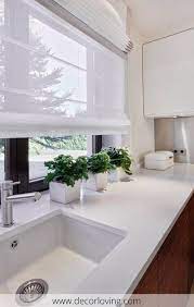 Semi Transparent Blind Curtain In The White Kitchen With Some Touches Of Green Modern Kitchen Curtains Kitchen Window Curtains Kitchen Window Blinds