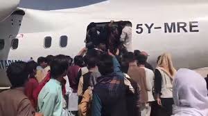 Locals near kabul airport claim that three young men who were holding themselves tightly in the locals while collecting the bodies of three men clinging to the wheels of the plane that took off from. 7c9y8wnct2oqfm