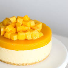 Mango Overload Cheesecake For This Hot Summer Christmas Rich Smooth Slightly Tangy And Has A Hidden Layer Of Ma Mango Cheesecake Desserts Cheesecake Recipes