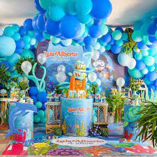 I decorated around the table with various sea shells, starfish, sponges, and handmade coral decorations. Fiesta Marina Underwater Theme Party Candy Theme Birthday Party Underwater Birthday
