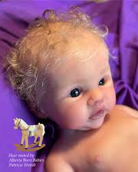 I am absolutely in love with this little one 😍 such soft little blonde  curls just pulls her all together ❤️❤️ This is Tweety by Bonnie Sieben,  full body silicone painted by