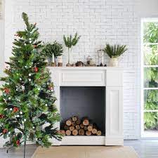 Our Best Christmas Greenery Deals Fake Fireplace Faux Fireplace Christmas Fireplace
