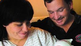 Alachua County's first baby of 2003 couldn't wait for trip to hospital