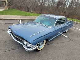 Image result for Dresden Blue 1961 Cadillac