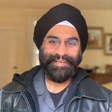 Should plastic totes be kept unstacked for storage?