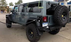 Long Wheelbase Stretch Jeep Wrangler Spied Autoweek Jeep Wrangler Jeep Cars Jeep