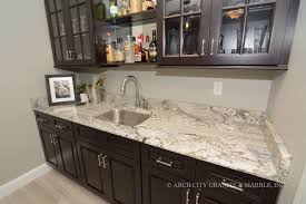 4 Granite Backsplashes To Compliment Beautiful Basement Granite Countertops Countertops Granite Countertops Kitchen Remodel Countertops